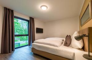 Yogasutra - Stilvolles 3-Zimmer-Apartment mit Seeblick, Balkon & Sauna