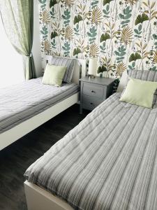 Appartements Le Cartier Appt F3, 7mn Disneyland, Parking,Terrace : photos des chambres