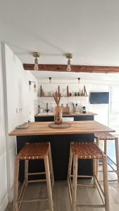 Appartements Place aux huiles : photos des chambres