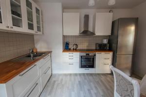 Appartements La Cure : photos des chambres