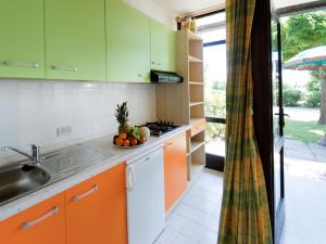 Holiday Home Lake Bungalow by Interhome