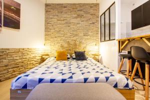 Appartements Le Jardin des Bois - 5 min de la Fosse Dionne : photos des chambres