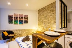 Appartements Le Jardin des Bois - 5 min de la Fosse Dionne : photos des chambres