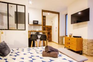 Appartements Le Jardin des Bois - 5 min de la Fosse Dionne : photos des chambres