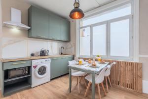 Appartements Le Green Lodge : photos des chambres