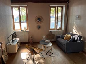 Appartements La Maison aux volets bleus 37 m3, Bords de Saone : photos des chambres