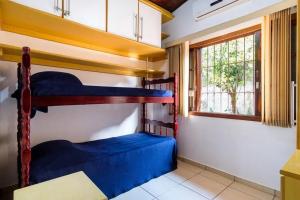 BH4 · BH4: CASA COM PISCINA AO LADO DA PRAIA GRANDE