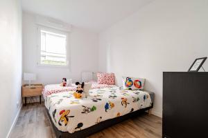 Appartements l'Eden familial - cosy T3 proche Disneyland avec jardin : photos des chambres
