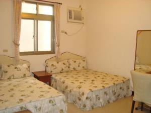 Phòng Tiêu Chuẩn 4 Người (Standard Quadruple Room)
