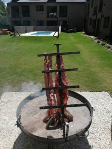 Departamento con pileta y asadores