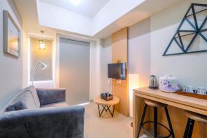 Comfort 1BR Apartment at Mustika Golf Residences By Travelio