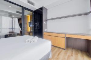 Good and Restful 1BR at The Smith Alam Sutera Apartment By Travelio