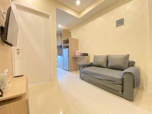 Pleasant 1BR Apartment at Parahyangan Residence near UNPAR By Travelio