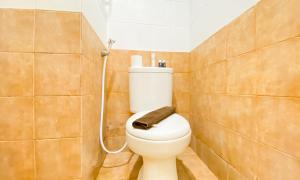 Studio Green Pramuka City Apartment with Mall Access By Travelio