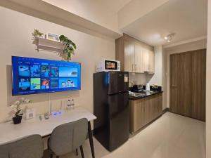 1BR Condotel with Balcony at FAME Residences #FM57