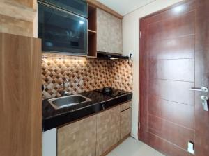 Cozy 2BR Apartment at Gateway Pasteur By Travelio
