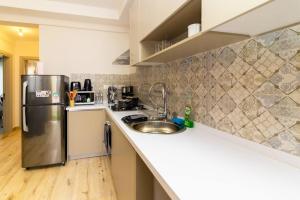 65-inch TV, Westlands Apt, Rooftop Pool, Gym, BBQ