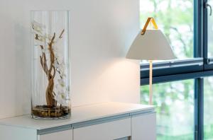 Tao-Suite mit Seeblick, Balkonterrasse & Sauna