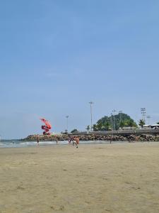 Loft em prédio em frente à praia