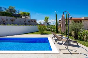 HADRIE LUXURY RESORT AND VILAS Rova