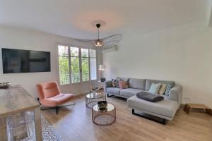 Charmant T2 avec balcon - Parking, AC, Wifi