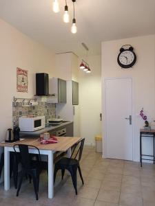 Appartements Centre ville-Rue commercante : photos des chambres