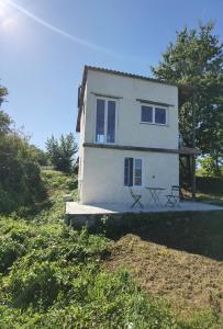 Maisons de vacances Tiny house bord de l-etang - Iri : photos des chambres