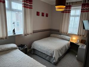 Family Room (2 Adults + 1 Child) room in West Vale Villa