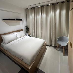 Chic & Cozy Apartment Near BGC with Home Theater Setup