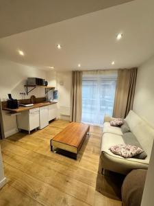 Appartements Charmant studio vue sur jardin : photos des chambres