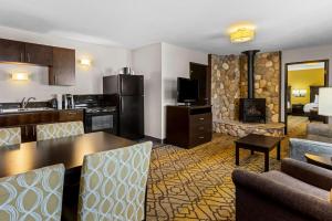 King Suite with Sofa Bed and Fireplace room in Best Western of Harbor Springs