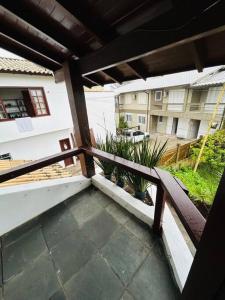 Casa pé na areia praia Garopaba