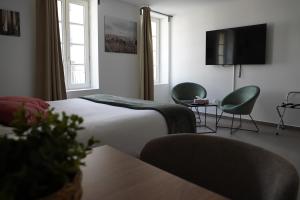 Appart'hotels SOUS LES PLATANES : photos des chambres