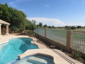 Spacious golf course house with pool heater, spa