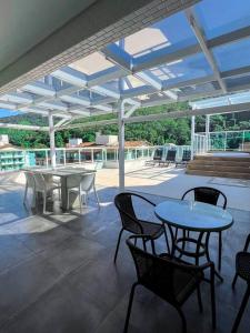 Cobertura Santorini Nova com Spa e Solário na Praia Grande