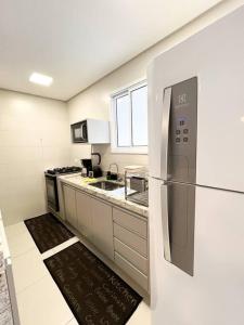 Cobertura Santorini Nova com Spa e Solário na Praia Grande