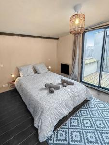 Maisons de vacances Maison Atypique acces direct Paris, Cuisine design : photos des chambres