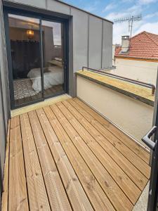 Maisons de vacances Maison Atypique acces direct Paris, Cuisine design : photos des chambres