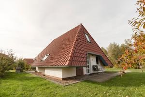 Ferienhaus "Happy Krabbe" Mellumplate 31