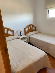 Apartamento con vistas y acceso privado a playa