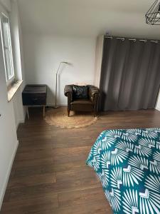 Appartements Vaste appartement avec parking gratuit, borne dispo et espace de travail : photos des chambres