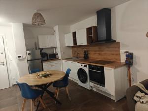 Appartements F2 cosy avec jardin : photos des chambres