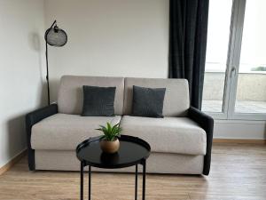 Appartement avec grande terrasse et parking