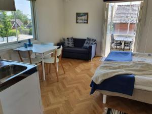 Central enrums lägenhet med altan