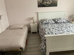 Maisons de vacances Maison de charme avec cour privee : photos des chambres