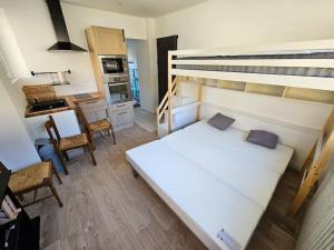 Appartements Studio 3 personnes avec terrasse : photos des chambres