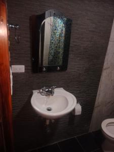 A Apartaestudio central amoblado con cocina y baño