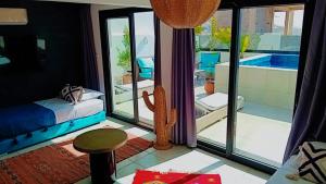 Villa vue mer TAMRAGHT avec piscine et terrasses 15 lits