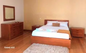 Quartos em Vila Paradise Porto da Cruz - Junqueira