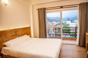 Montana Inn - Ubytování bez kategorie ve městě Pókhara